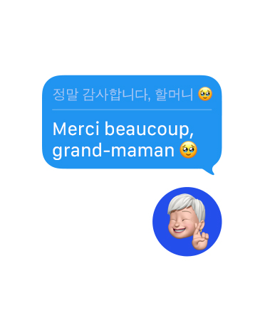 Traduction en direct dans Messages, où un texto de remerciement d’une utilisatrice à sa grand-mère est automatiquement traduit en coréen, avec un émoji de clin d’œil sous la bulle de texte
