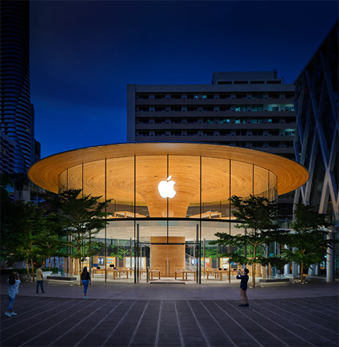 Exterior of an Apple Store location at night.