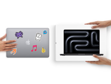 Een hand schuift een MacBook met stickers naar twee handen die een nieuwe verpakte MacBook vasthouden