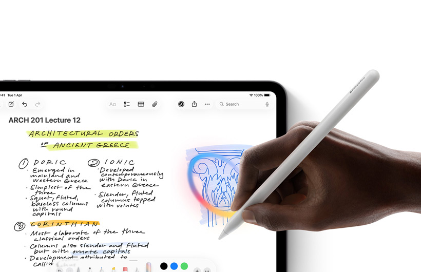 A hand holding Apple Pencil draws a circle round a sketch in the Notes app on iPad.