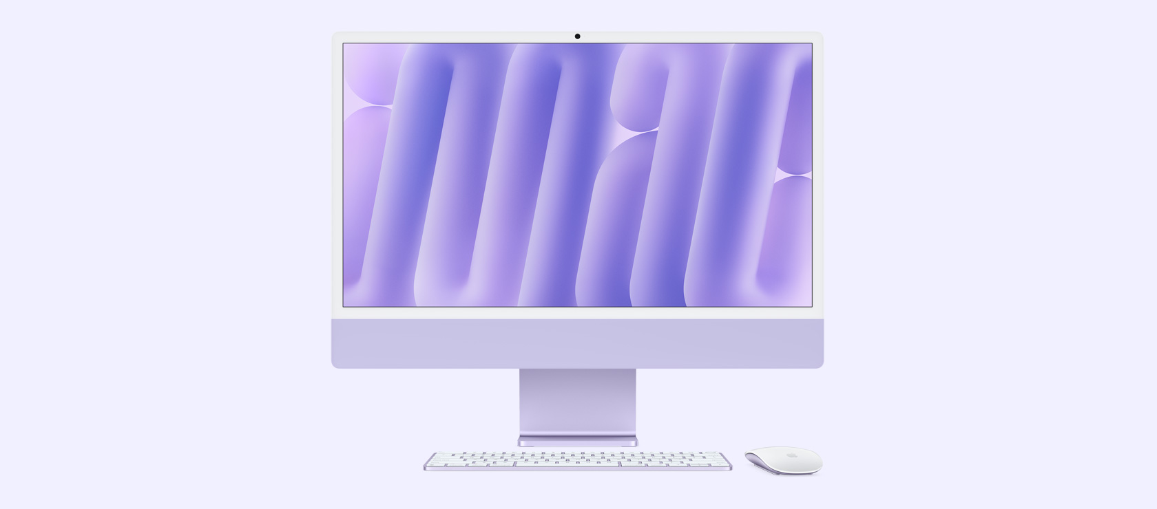 Skats no priekšpuses uz violetu iMac ar pieskaņotas krāsas peli un tastatūru
