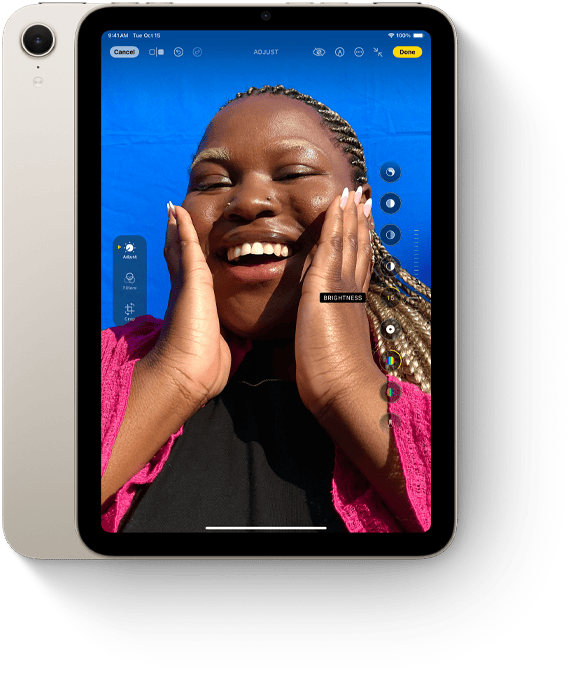 Vertikāli novietots iPad mini ar Photos aplikāciju.