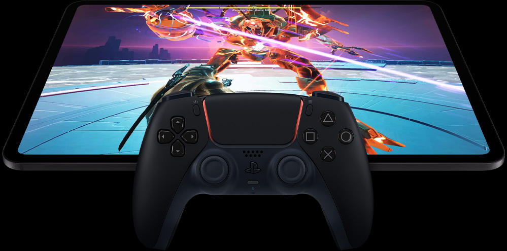 Wireless PlayStation controller atop iPad Pro, front exterior, landscape orientation, space black color, display showing a video game screen of a futuristic robot mech with a glowing pink laser sword