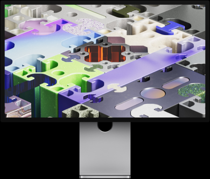 Studio Display XDR 的正面，背景圖片顯示如拼圖般的 3D 圖案