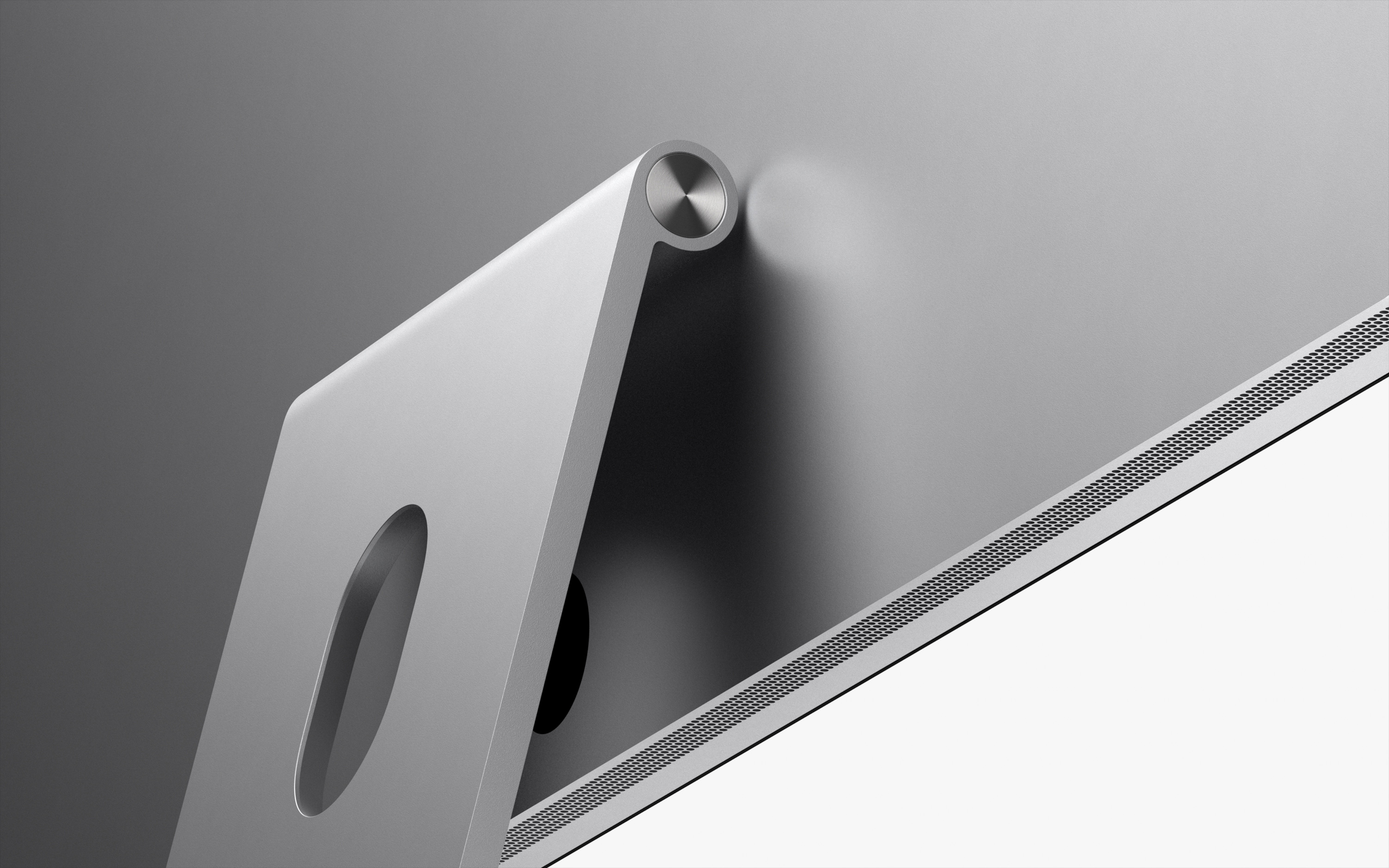 Studio Display iestiprināts statīvā ar maināmu slīpumu, skats no aizmugures